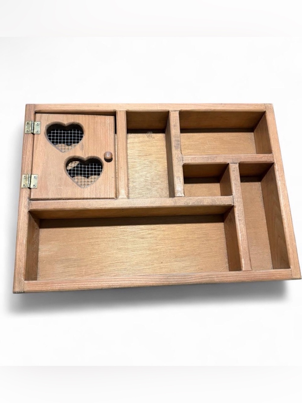 Vintage wooden trinket shelf with heart cutouts